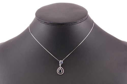 Lot 127 - A sapphire and diamond enhancer pendant on...