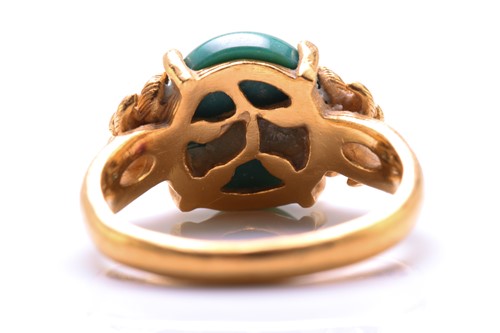Lot 119 - A turquoise dress ring, featuring an oval...
