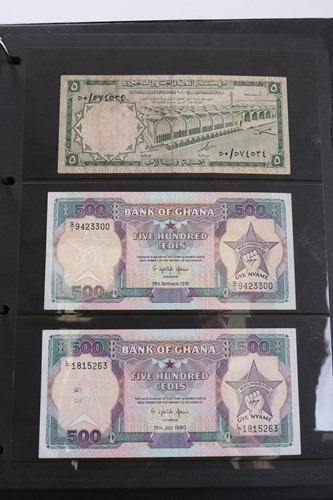 Lot 300 - Three albums of world bank notes, to include a...