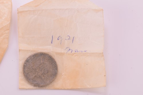 Lot 174 - A collection of world coins and paper notes;...
