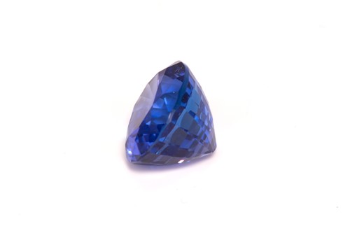 Lot 217 - A Tanzanite loose gemstone, oval-shaped...