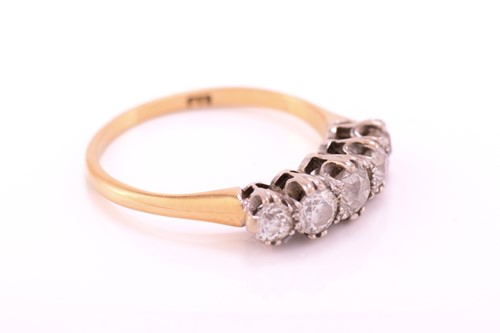 Lot 161 - A five stone half hoop diamond ring; the...