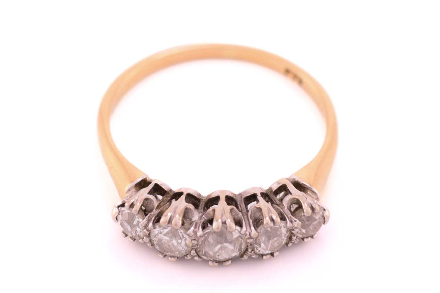 Lot 161 - A five stone half hoop diamond ring; the...