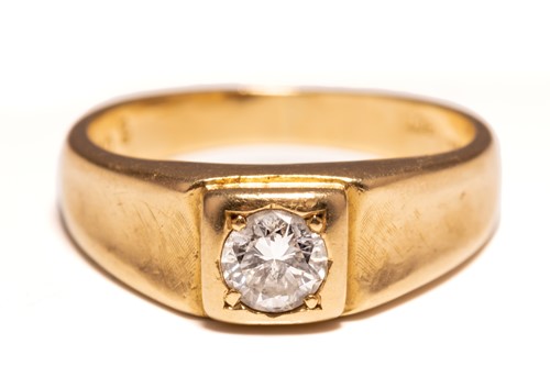 Lot 144 - A diamond solitaire ring, consists of a...