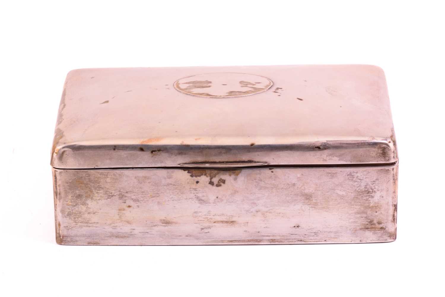 Lot 374 - An Edwardian silver cigar box, with rounded...