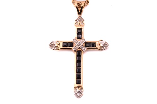 Lot 232 - A sapphire and diamond cross necklace in 9ct...