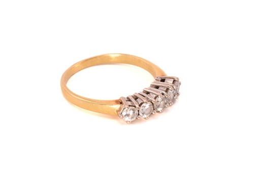 Lot 212 - A five-stone diamond ring in 18ct gold,...