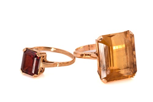 Lot 227 - A 9ct gold and garnet ring and a large citrine...