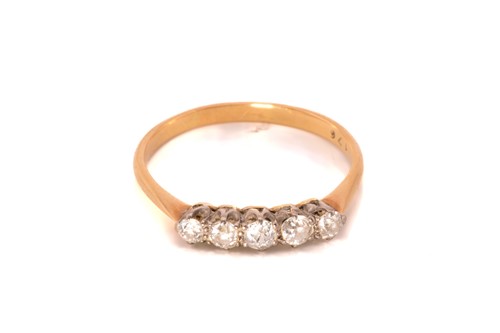 Lot 74 - Two five-stone half hoop rings with diamond...