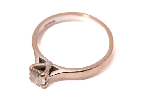 Lot 168 - A diamond solitaire ring in 18ct gold,...