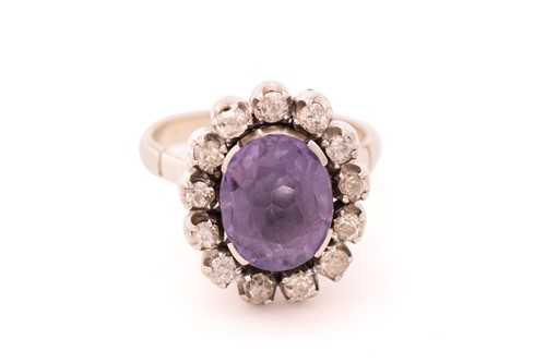 Lot 83 - A synthetic colour-changing sapphire and...