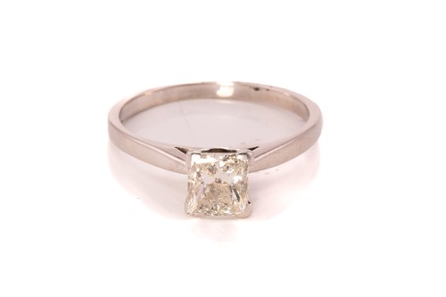 Lot 174 - A platinum diamond solitaire ring, featuring a...