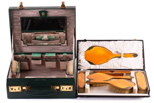 Lot 388 - Two cases of vanity or grooming set; The first...