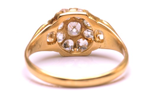Lot 117 - A diamond cluster ring in 18ct gold,...