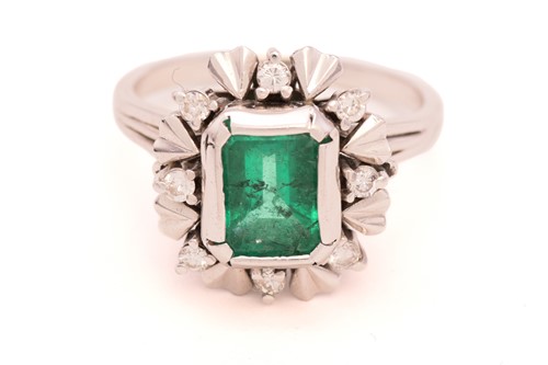 Lot 32 - A synthetic emerald cocktail ring, centred...