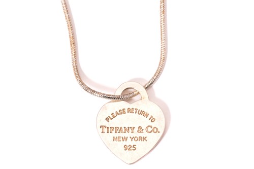 Lot 48 - A Tiffany & Co. bookmark and a heart tag...