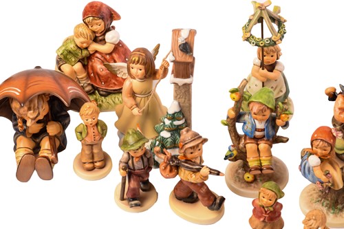 Lot 222 - A large collection of modern Hummel figures,...