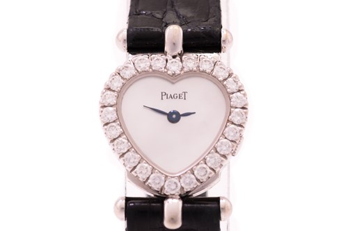 Lot 343 - A Piaget lady's diamond set dress watch, with...