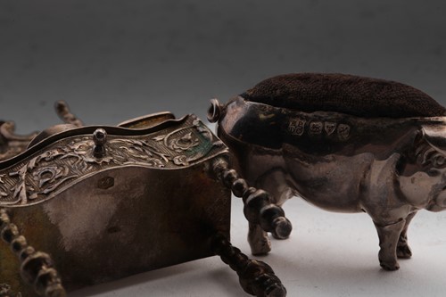 Lot 364 - An Edwardian pin cushion in the form of a pig;...