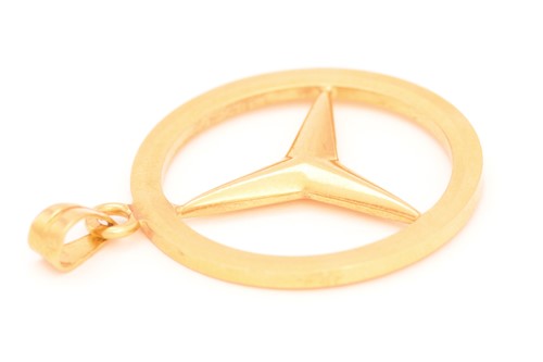 Lot 88 - A Mercedes-Benz logo pendant, featuring the...