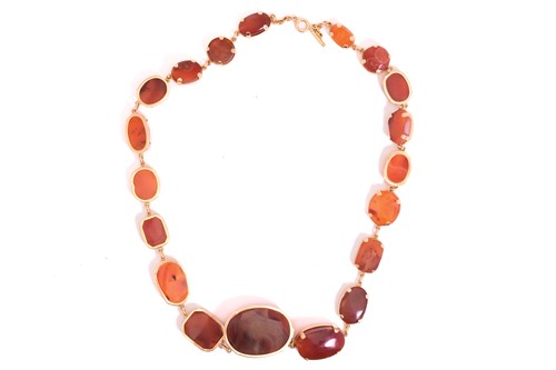 Lot 239 - A multi-shaped carnelian and sardonyx necklace...