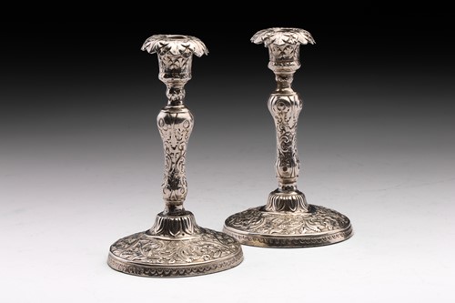 Lot 443 - A pair of Victorian silver chambersticks; the...