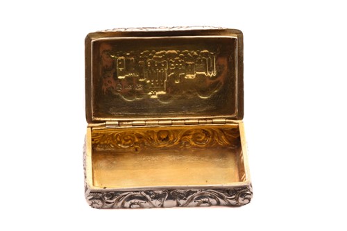 Lot 395 - A George IV castle top snuff box; rounded...