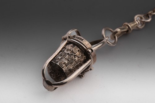 Lot 450 - A 19th century continental chatelaine, with...