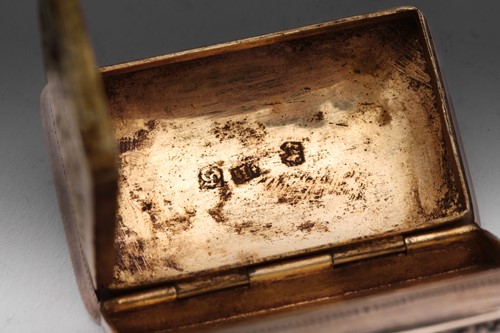 Lot 414 - A George IV snuff box; rounded rectangular...