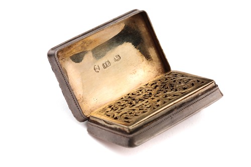 Lot 414 - A George IV snuff box; rounded rectangular...