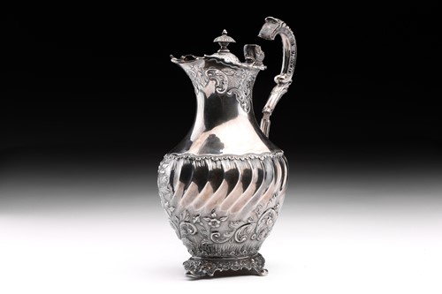 Lot 456 - An Edwardian silver baluster water jug,...