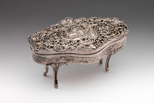 Lot 430 - A large silver dressing table box of bow...