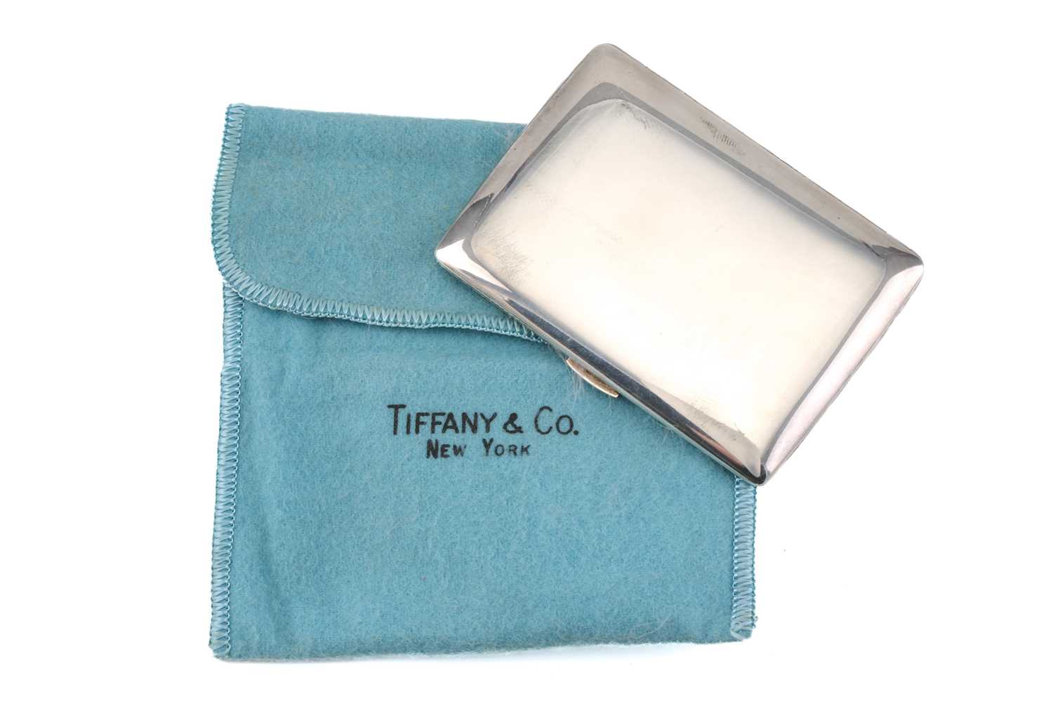 Lot 323 - A Tiffany & Co. silver powder compact,...