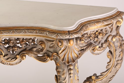 Lot 116 - An 18th-century style Venetian carved, painted...