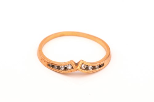 Lot 59 - A three-piece diamond ring set in 18ct gold,...
