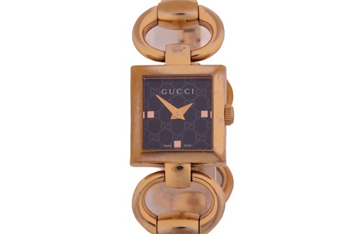 Lot 216 - Three Gucci quartz watches, with the first...