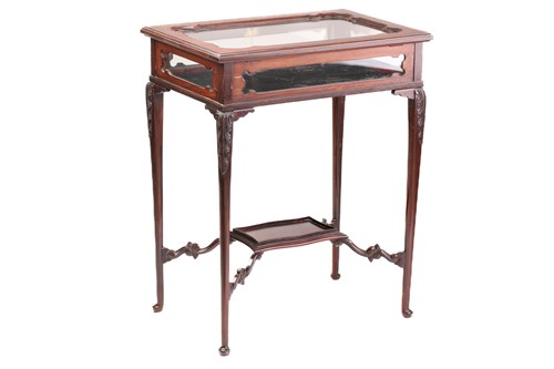 Lot 143 - An Edwardian mahogany "Chippendale" style...