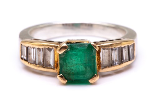 Lot 135 - An emerald and diamond dress ring, centred...