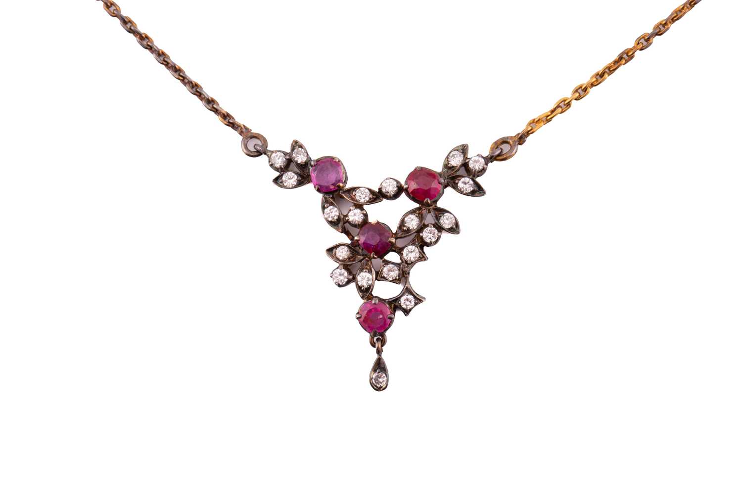 Lot 24 - A diamond and ruby necklace, with four round...