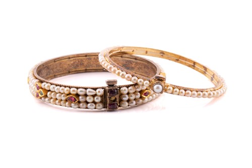 Lot 121 - Indian gem-set jewellery including two bangles...