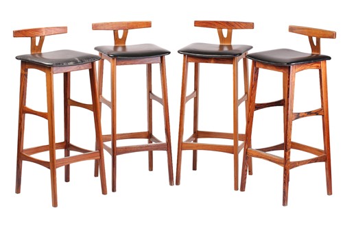 Lot A set of four late 1960s rosewood bar stools,...