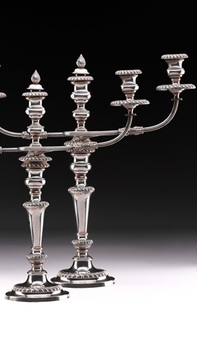 Lot 498 - A pair of large silver plated two branch...