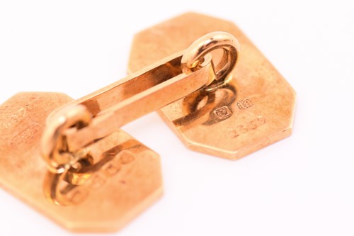 Lot 45 - A pair of 18 carat gold cufflinks in an...