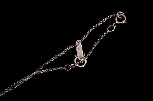 Lot 147 - Tiffany & Co. - 'Victoria' pendant in platinum...