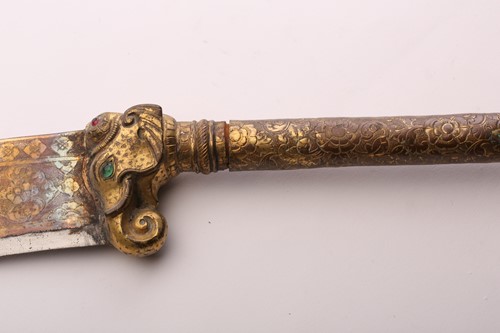 Lot 375 - An Indian Bhuj (elephant axe), India Kutch,...