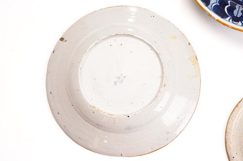 Lot 409 - Five 18th century Dutch Delft plates,...