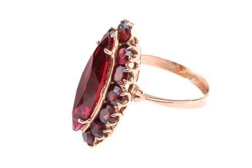Lot 36 - A synthetic ruby and garnet dress ring,...