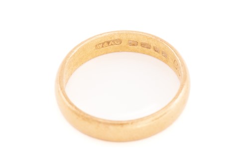 Lot 21 - A 22ct gold wedding band and a 9ct gold ring;...