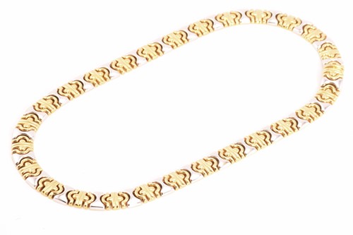 Lot 100 - An 18ct bi-coloured gold necklace in the style...