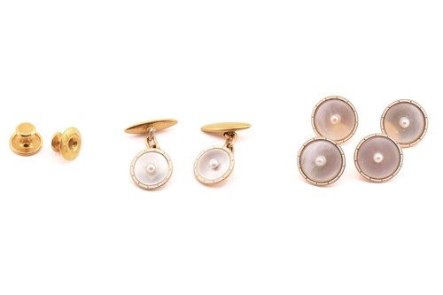 Lot 11 - A mother of pearl and pearl dress set in 18ct...